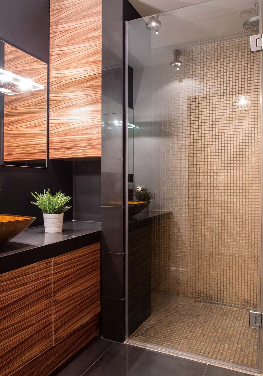 New modern bathroom with fancy shower on the wall